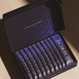 An open Serune box showing a row of Evening Ritual sachets