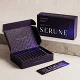 The Serune box open and closed on a stone slab, with a sachet in front